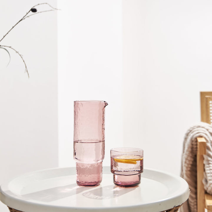 Set of pink handmade textured glass carafe and matching drinking glass 