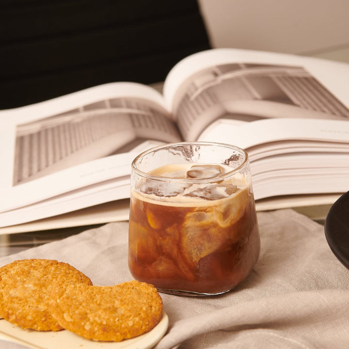 Handmade structured glass with iced coffee in